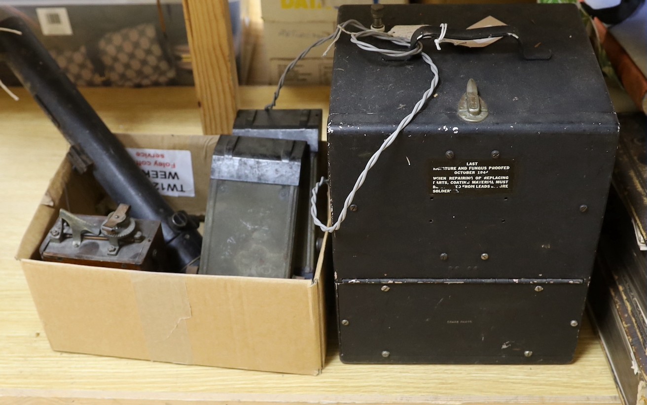 A collection of vintage military equipment, including a WWII British Tank Telescope Sight No. 33 MK III, two tank periscopes, a US Army Signal Corps Frequency Meter by Zenith and a Vandervell CAV Morse Code box (5)